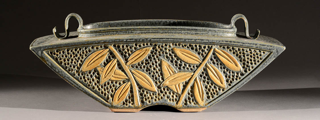 Hand carved ceramic vessel by Jim and Shirl Parmentier